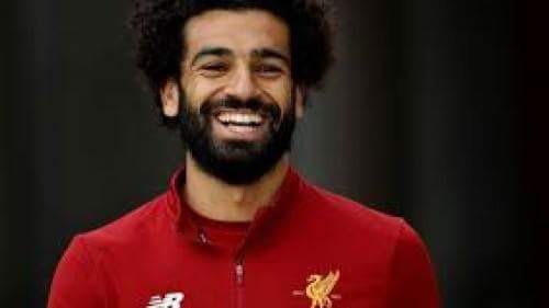 ”محمد صلاح” يحقق حلم طفل الصعيد ويرسل له التيشيرت الخاص به