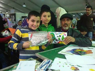 ورشة فنية لتعليم أساسيات فن المانديلا بمعرض الكتاب