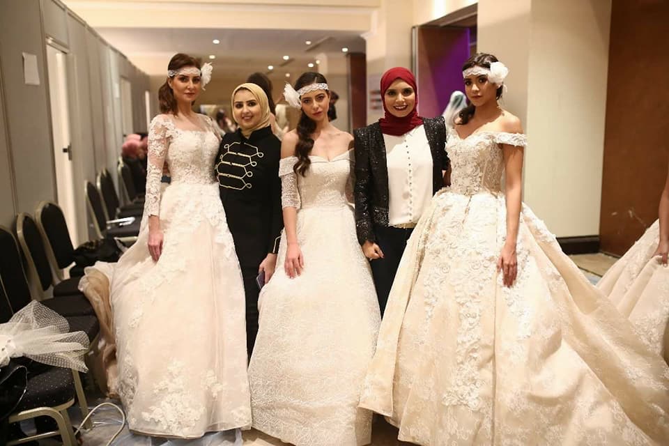 بالصور بسنت جلال ورنا نجيب يعرضان أحدث فساتين 2018