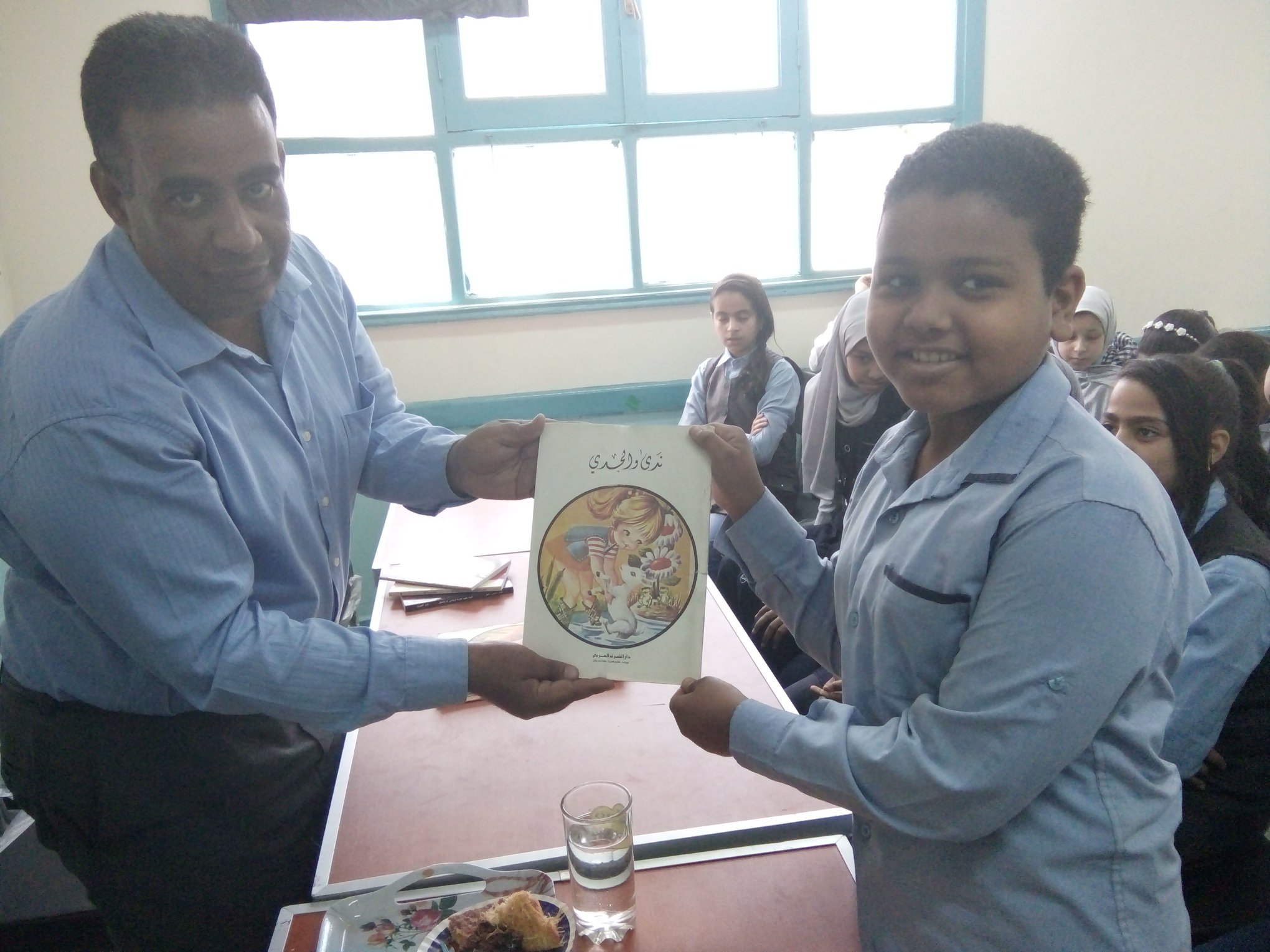 كيفية كتابة قصة قصيرة بمدرسة الشهيد مصطفي عباس الابتدائية بقنا