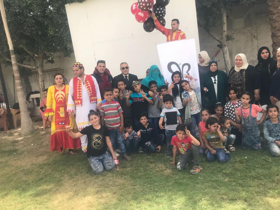 فريق ارسم بسمة يحتفل بيوم اليتيم بدار المركبات