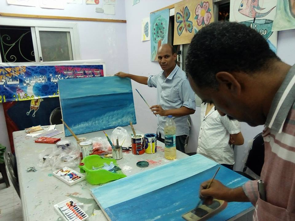 ورشة فى التصوير الزيتي بمكتبة الخالدين