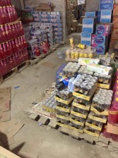 ضبط 1570 عبوة مواد غذائية غير صالحة للاستهلاك الآدمي داخل مخزن بشرق الإسكندرية